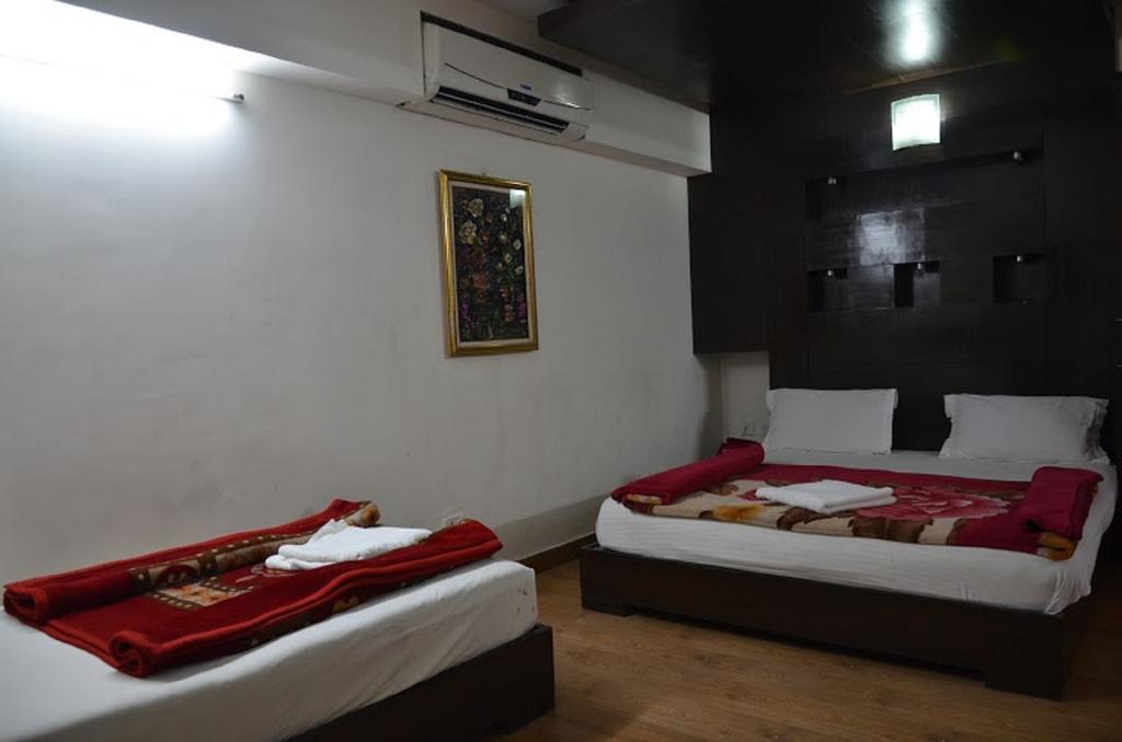 Hotel Durga International Nueva Delhi Habitación foto